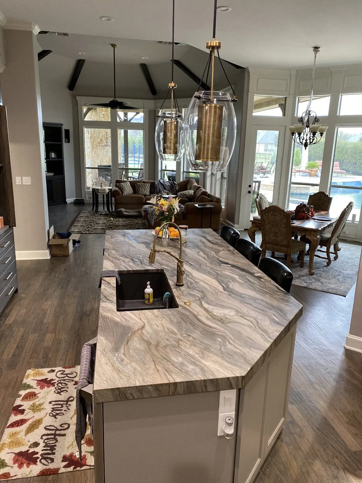 Quartzite island with a seating run — Kitchen